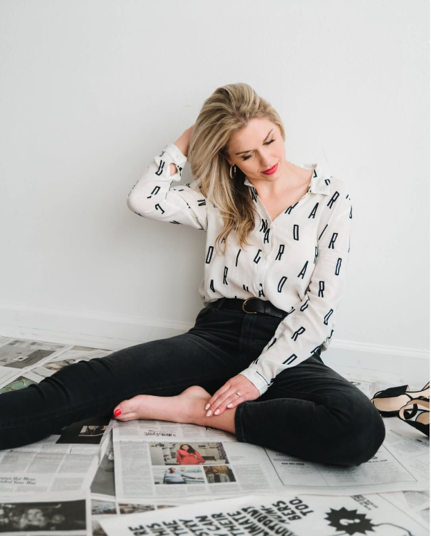 Sarah Klongerbo looking down, thinking about how ChatGPT can't write emotional copy